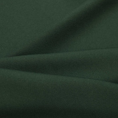 Ткань костюмная 21010 2076, 225 гр/м2, шир.150см, цвет т.зеленый - купить в Соликамске. Цена 394.71 руб.